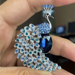 Elegant Blue and Silver Peacock Brooch